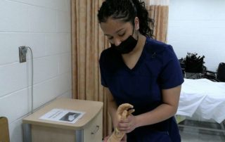 Eli Whitney Health Technology student Valerie Garcia in the shop