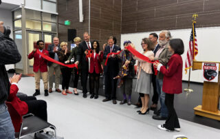 Image of special guests and SkillsUSA students cutting the ribbon at Platt Tech Grand Opening