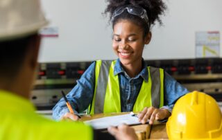 Student writing on clipboard